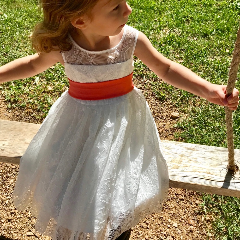 Sleeveless knee length flower girl dress